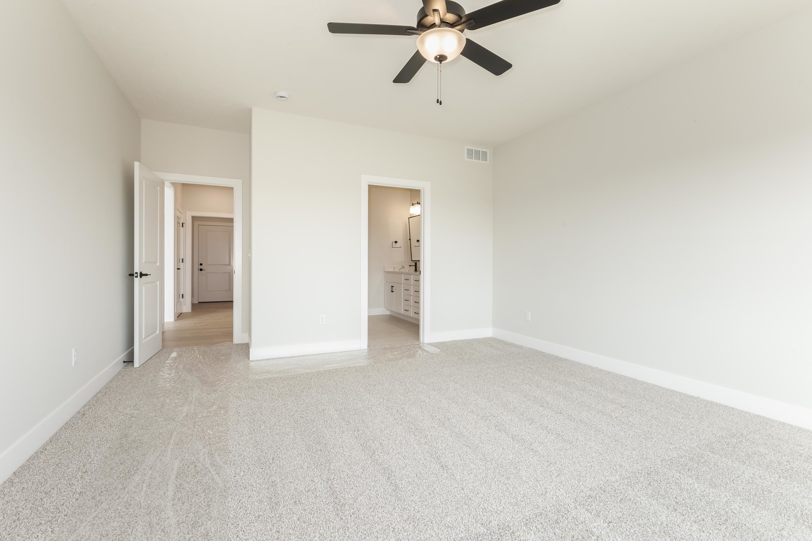 1004 Mount Carmel Road Bloomington, IL 61705 - Photo 22 of 44 a view of an empty room and chandelier fan