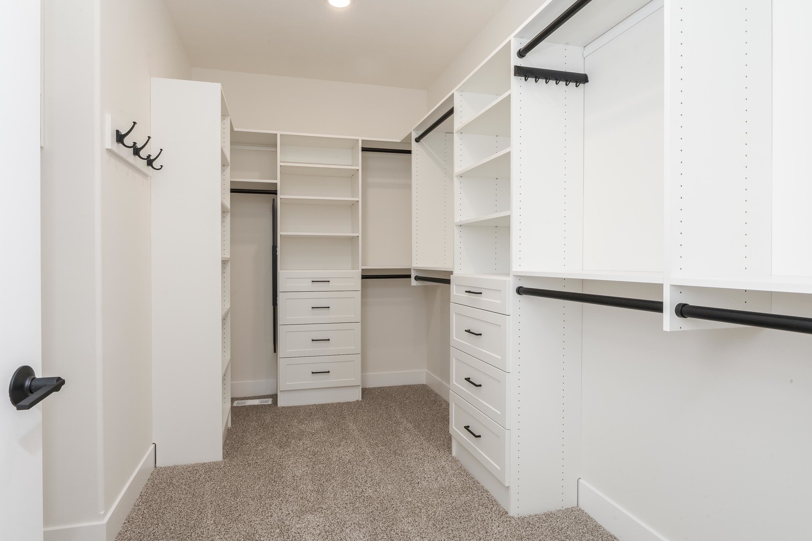 1004 Mount Carmel Road Bloomington, IL 61705 - Photo 25 of 44 a view of walk in closet with empty racks