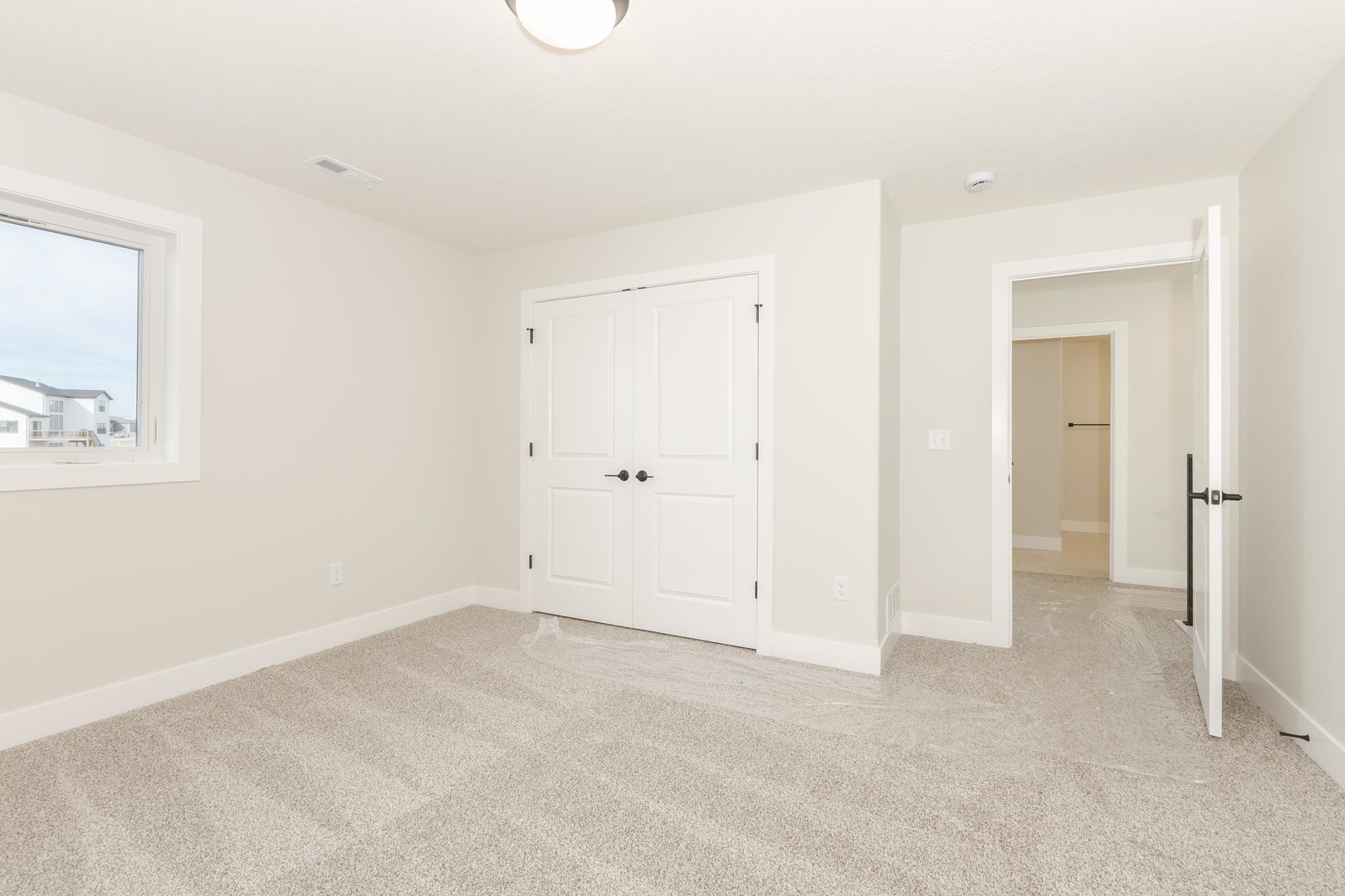 1004 Mount Carmel Road Bloomington, IL 61705 - Photo 35 of 44 an empty room with a bathroom