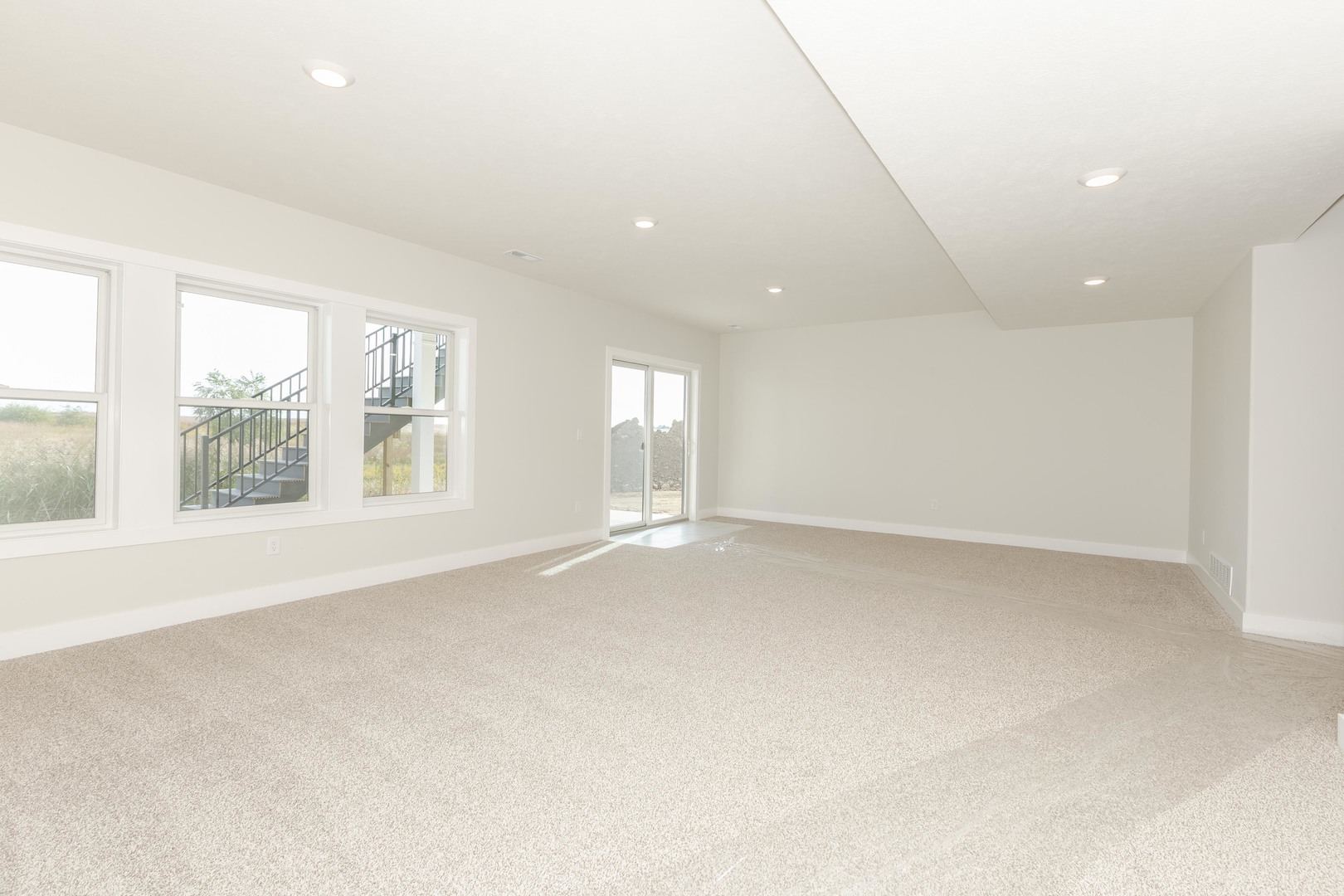 1004 Mount Carmel Road Bloomington, IL 61705 - Photo 38 of 44 an empty room with windows