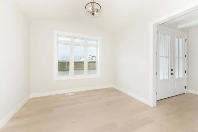 an empty room with windows