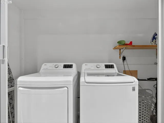 a utility room with dryer and washer