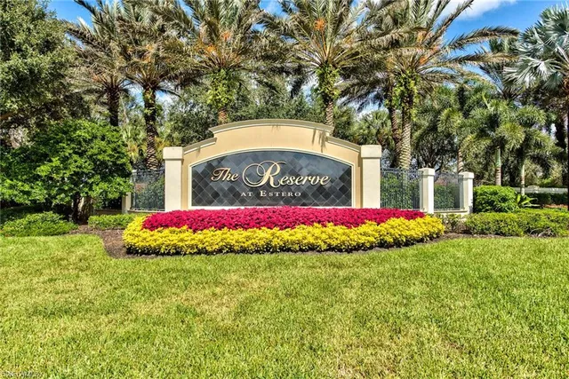 a view of an house with basketball court