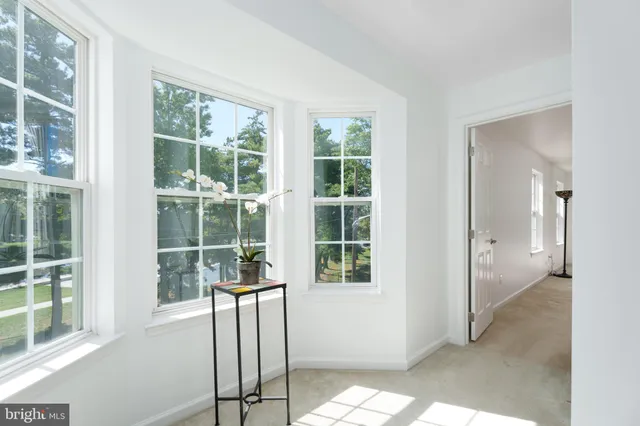 a view of a door and a window