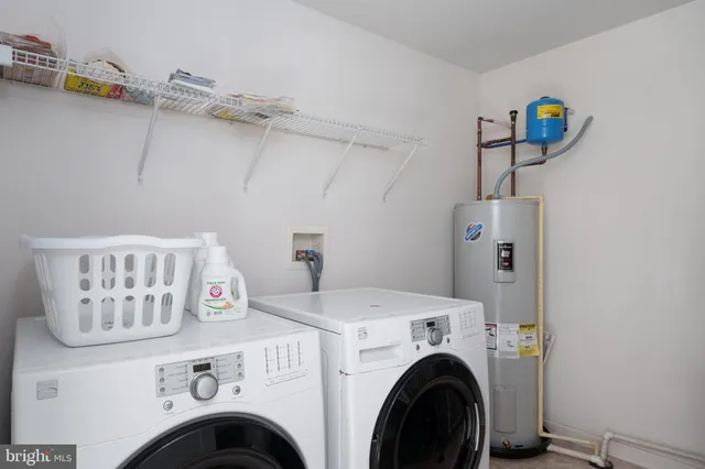 a view of livingroom with washer and dryer