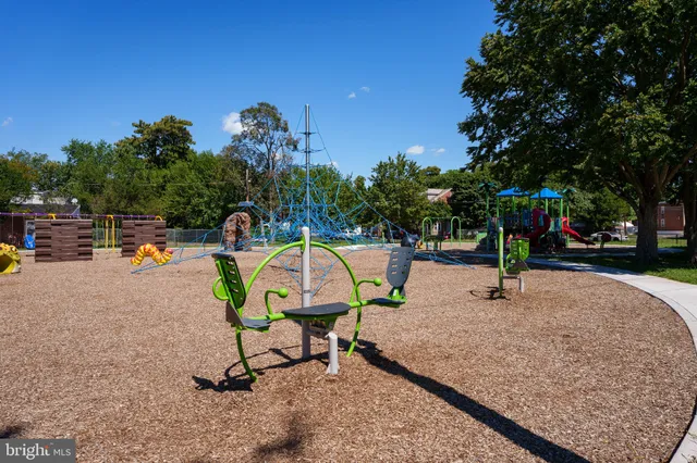 a view of a park with swings