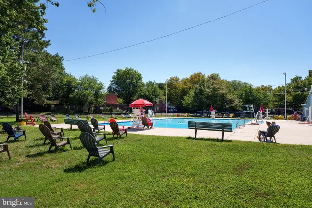 a view of a park with sitting area