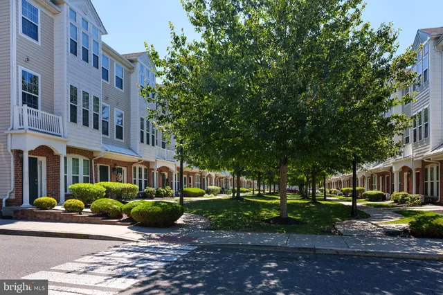 a view of a building with a garden