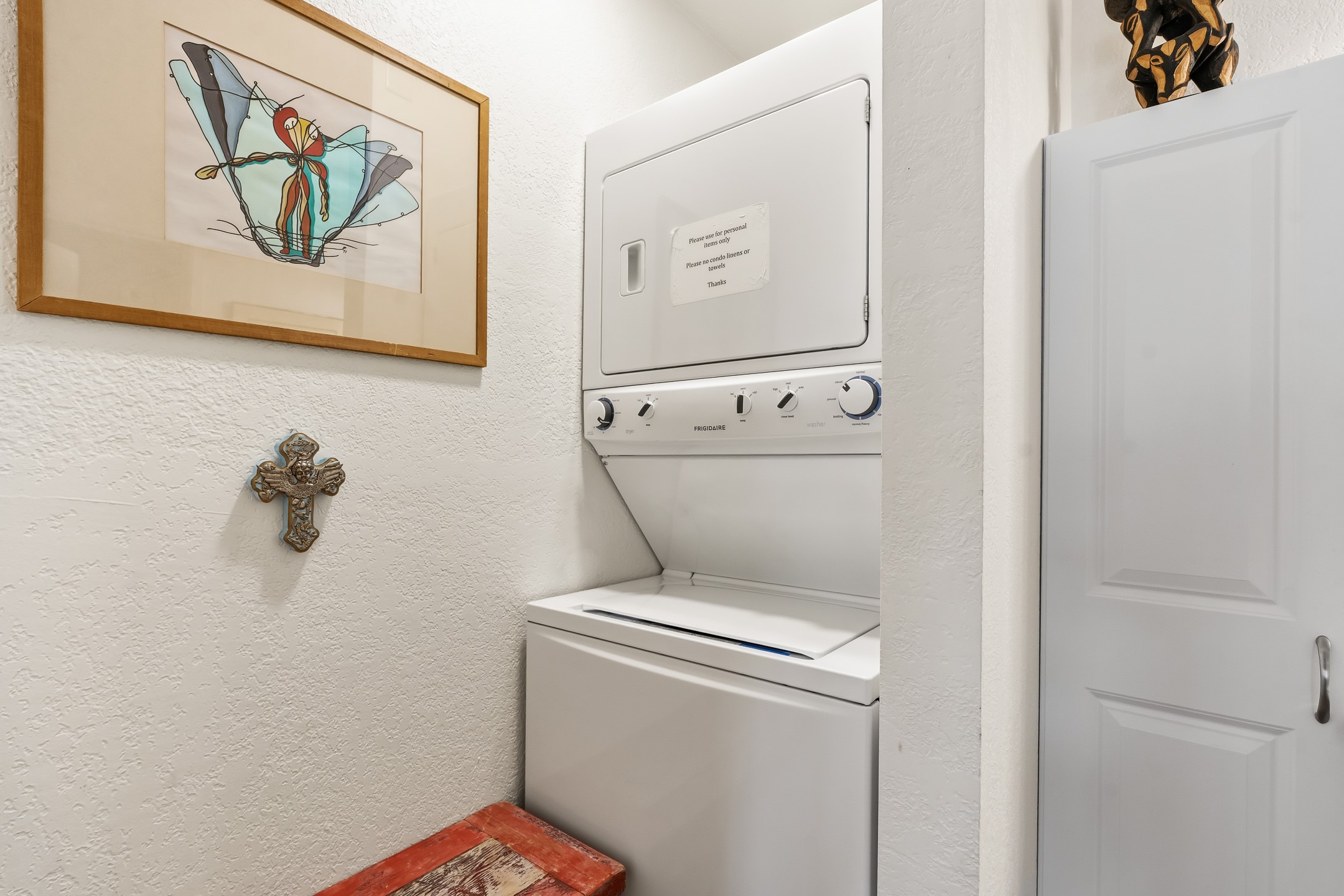 320 Artist Road, Unit 93 Santa Fe, NM 87501 - Photo 29 of 40 Washer/dryer in primary bathroom