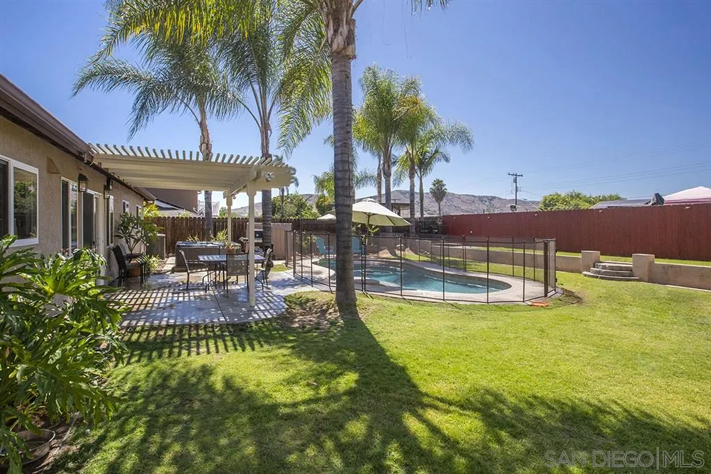 9228 Bellagio Road Santee, CA 92071 - Photo 23 of 25 a view of a swimming pool with a patio