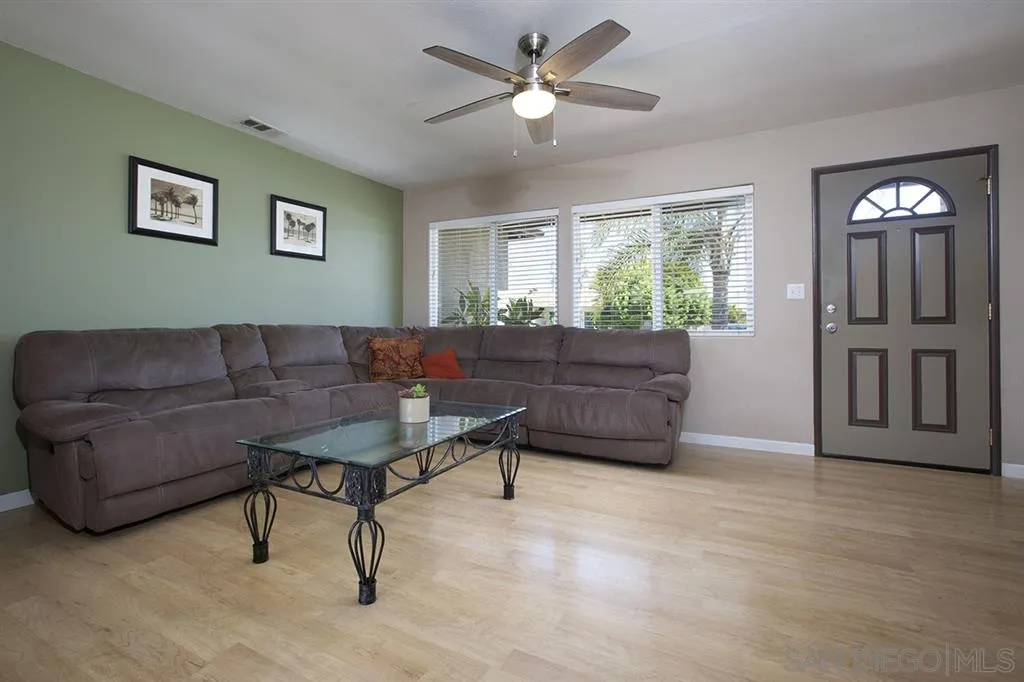 9228 Bellagio Road Santee, CA 92071 - Photo 4 of 25 a living room with furniture and a window