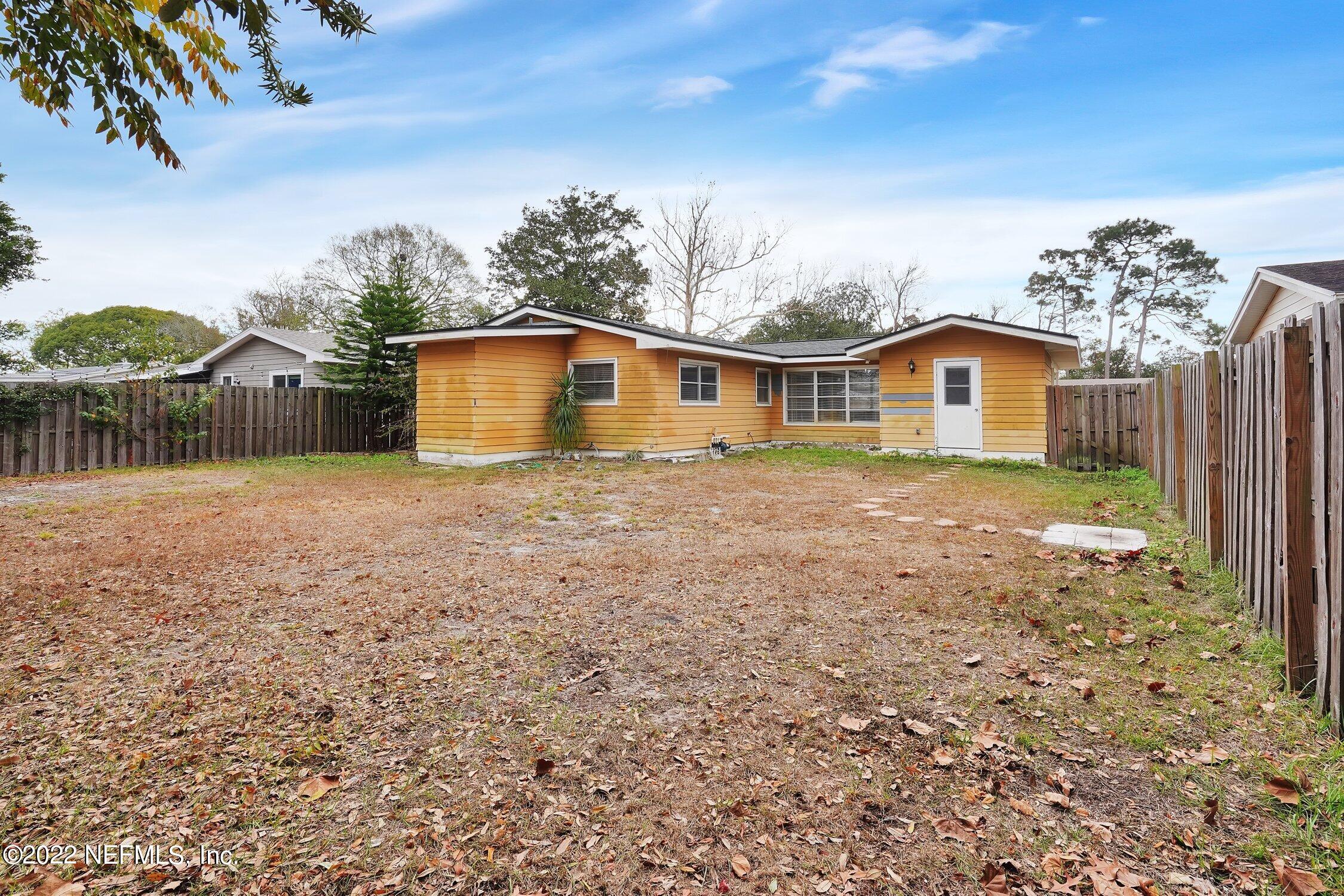 208 Baracoa Court St. Augustine, FL 32086 - Photo 29 of 32 a view of a house with a yard