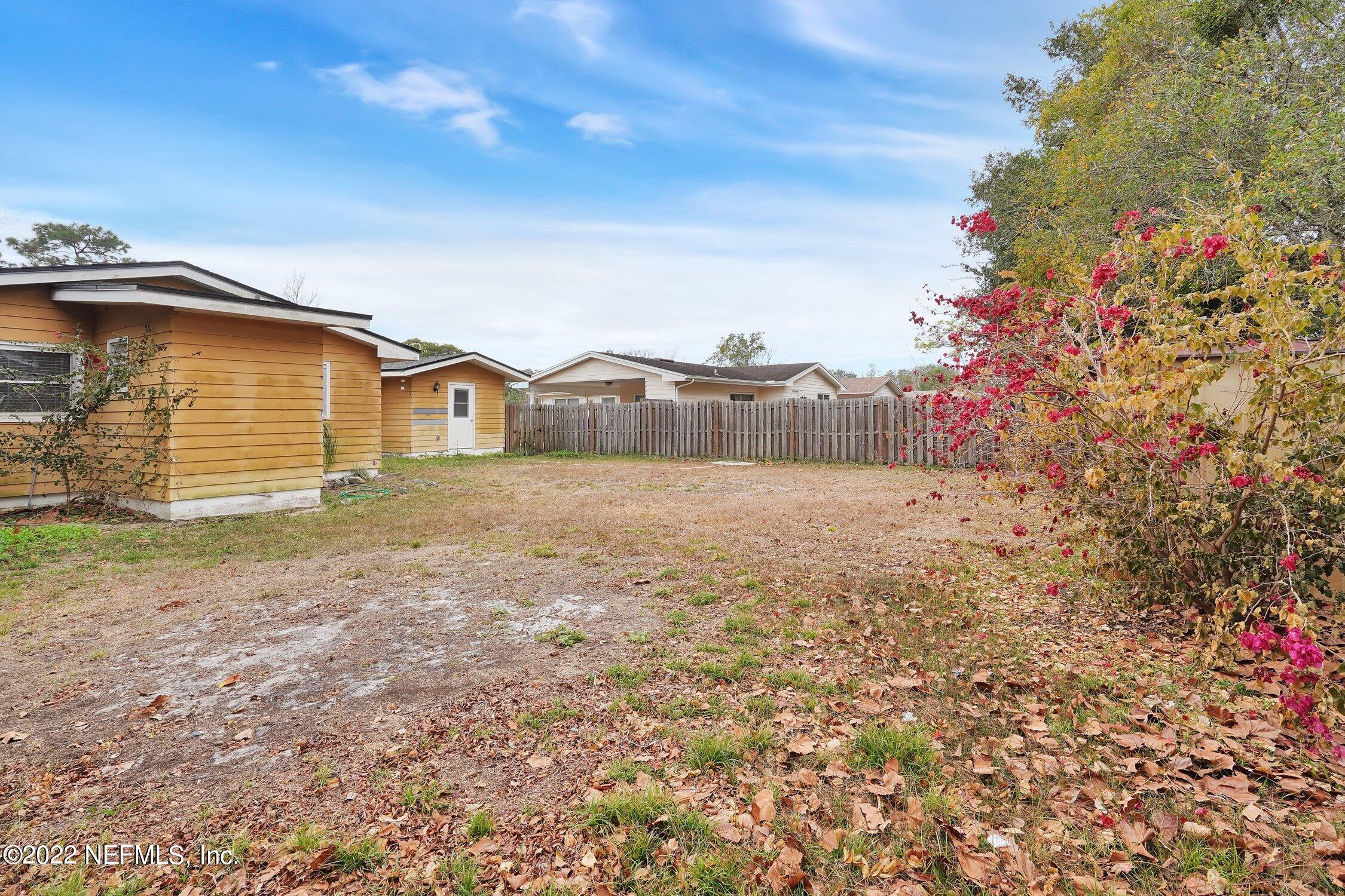 208 Baracoa Court St. Augustine, FL 32086 - Photo 30 of 32 a view of a house with a yard