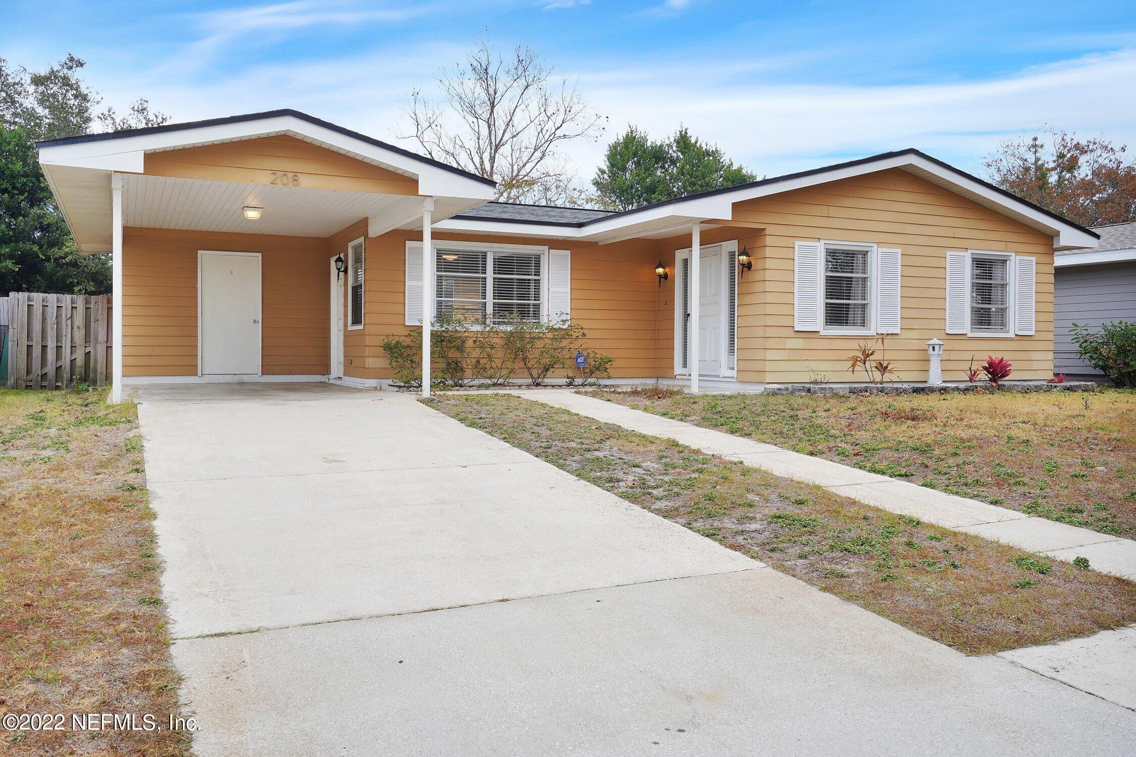 208 Baracoa Court St. Augustine, FL 32086 - Photo 3 of 32 a front view of a house with a yard