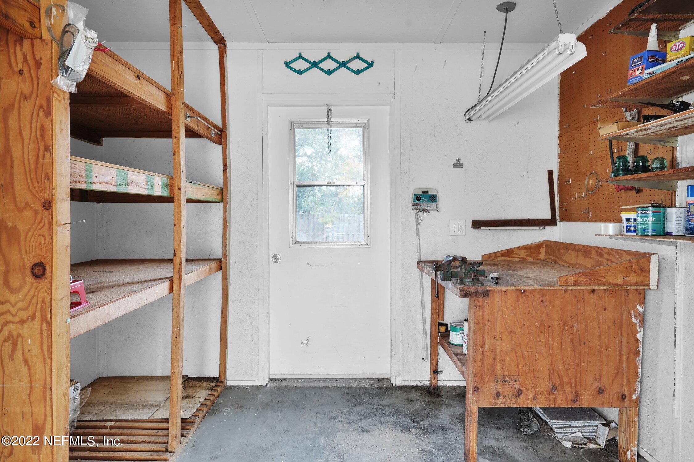 208 Baracoa Court St. Augustine, FL 32086 - Photo 32 of 32 a room with storage and utility