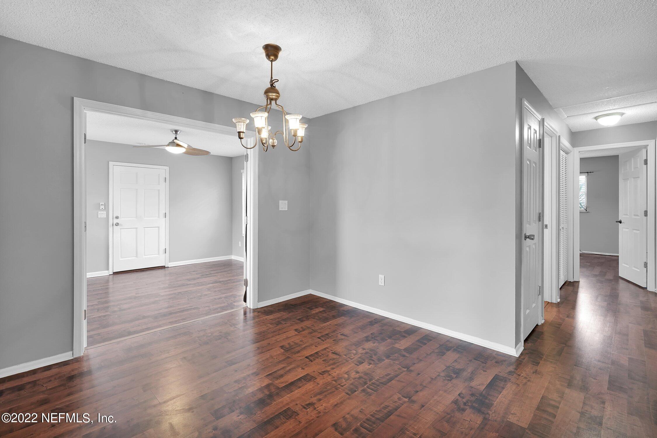 208 Baracoa Court St. Augustine, FL 32086 - Photo 10 of 32 a view of a hallway with wooden floor