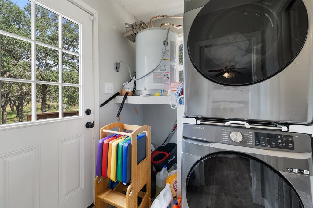 396 Ranch Road 2721 Johnson City, TX 78636 - Photo 27 of 36 a utility room with dryer and washer