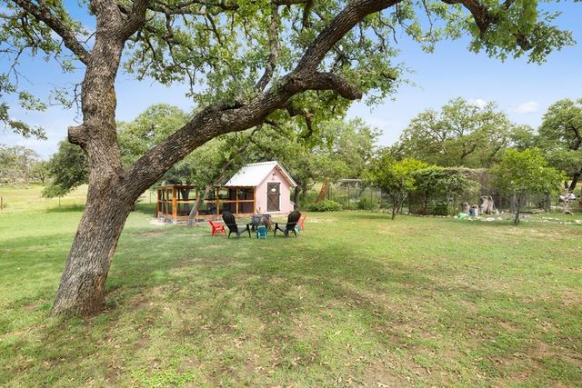 a view of backyard with green space
