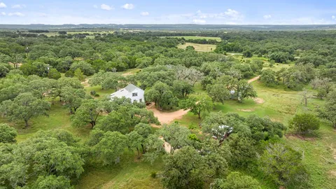 a view of a lake and a yard