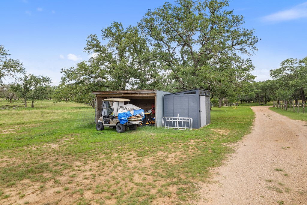 396 Ranch Road 2721 Johnson City, TX 78636 - Photo 36 of 36 a view of a house with a yard