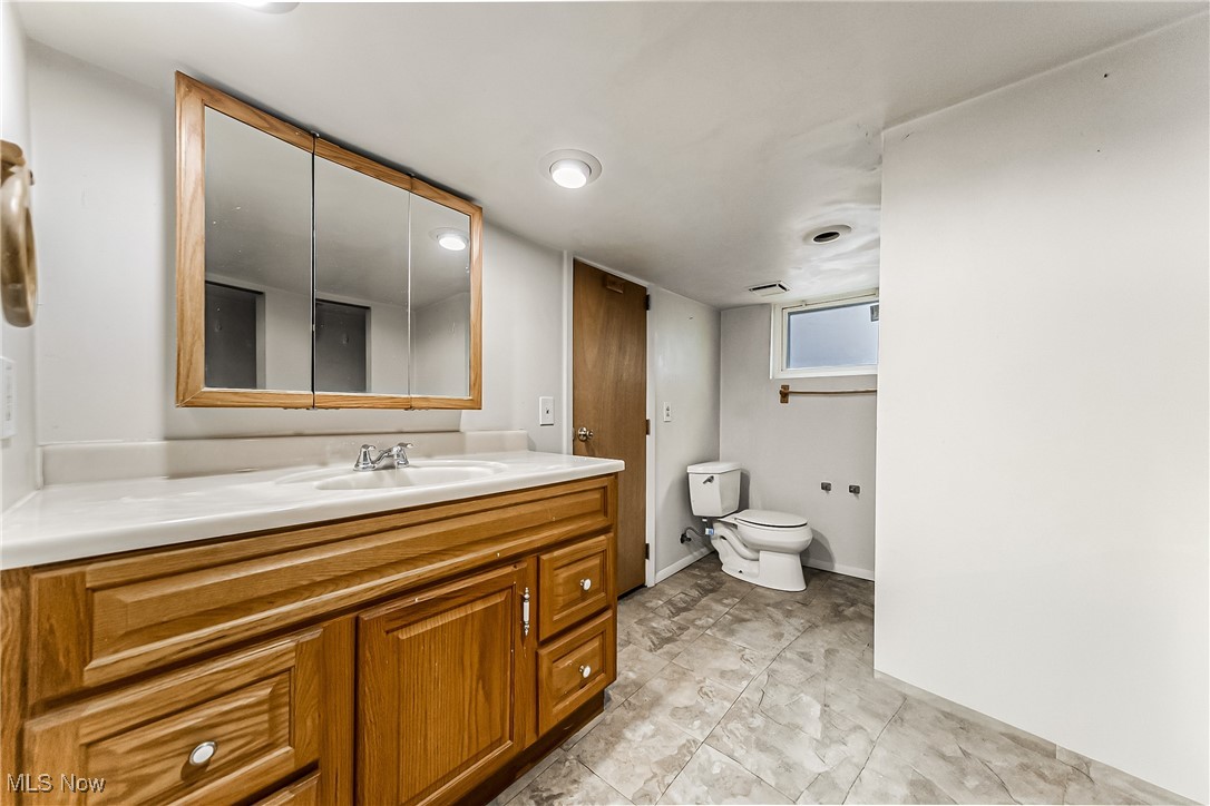 2014 Cook Avenue Cleveland, OH 44109 - Photo 32 of 37 Bathroom featuring vanity and toilet