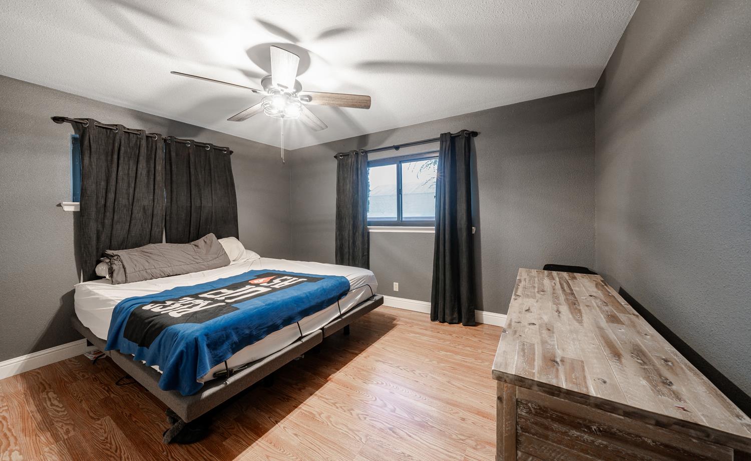 27152 Perkins Road Madera, CA 93637 - Photo 18 of 25 a bedroom with a bed and window