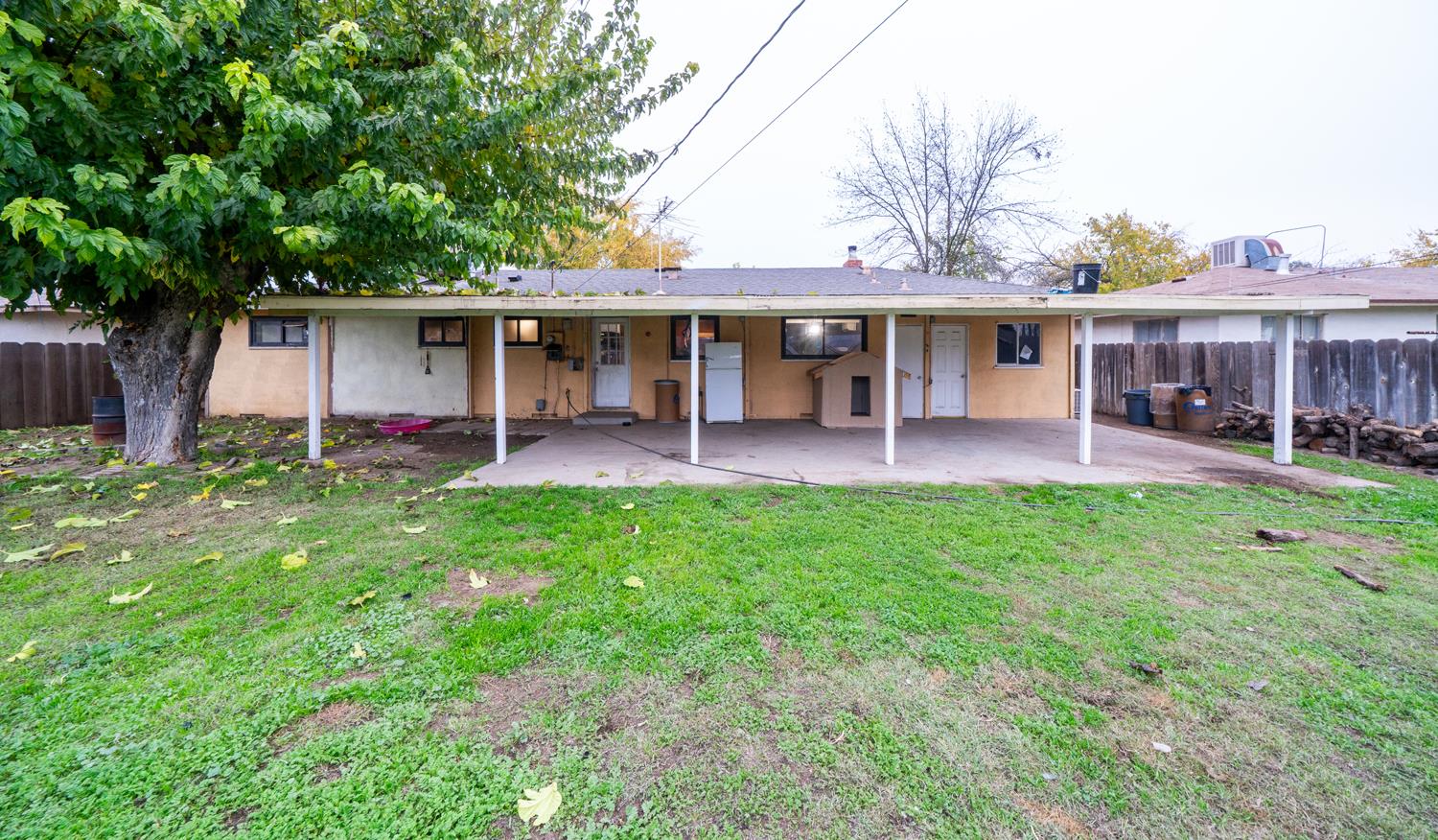 27152 Perkins Road Madera, CA 93637 - Photo 25 of 25 a view of a house with a yard and sitting area