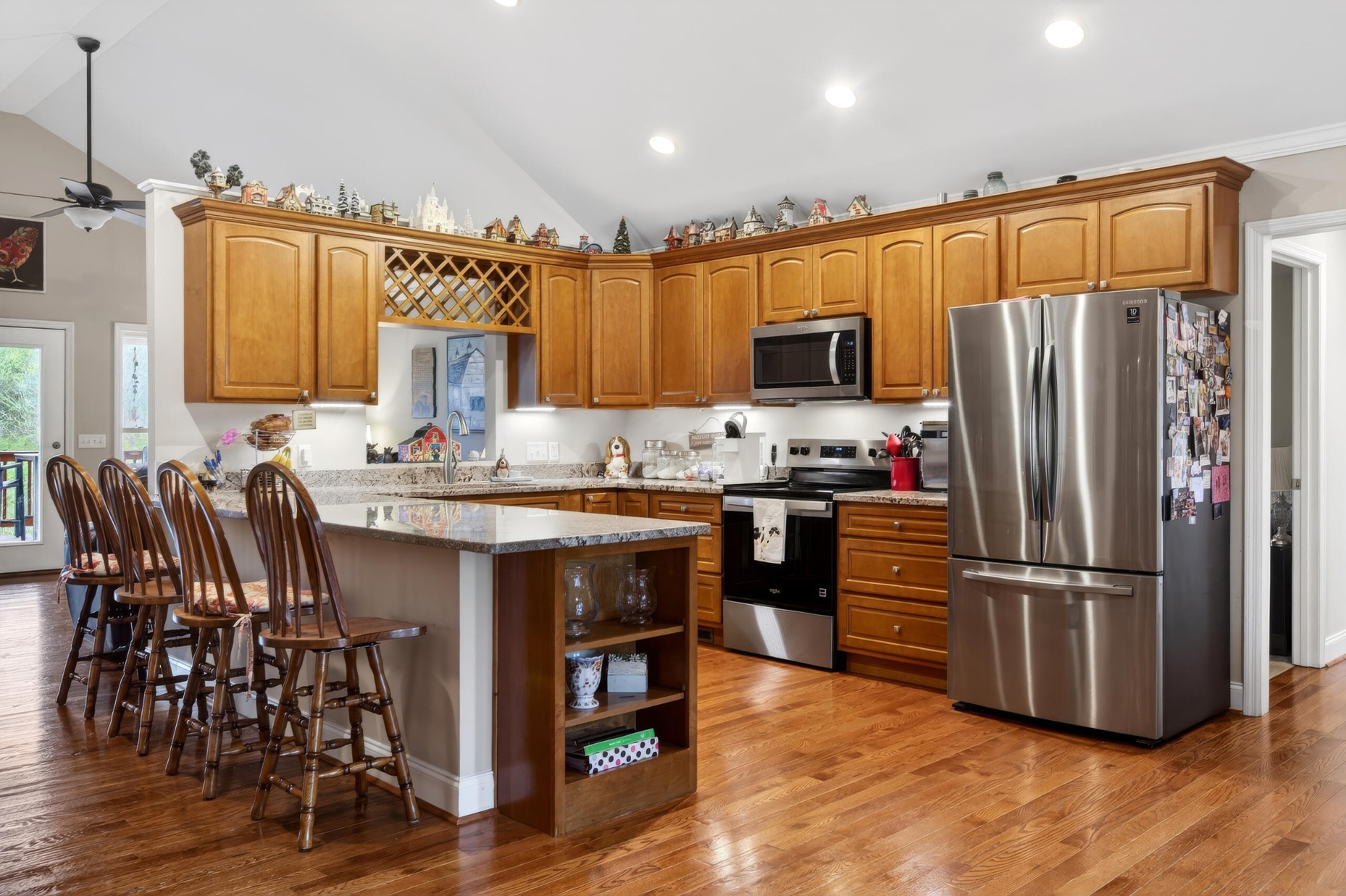 2181 Curbow Bridge Road Old Fort, TN 37362 - Photo 12 of 56 a kitchen with granite countertop a refrigerator and microwave