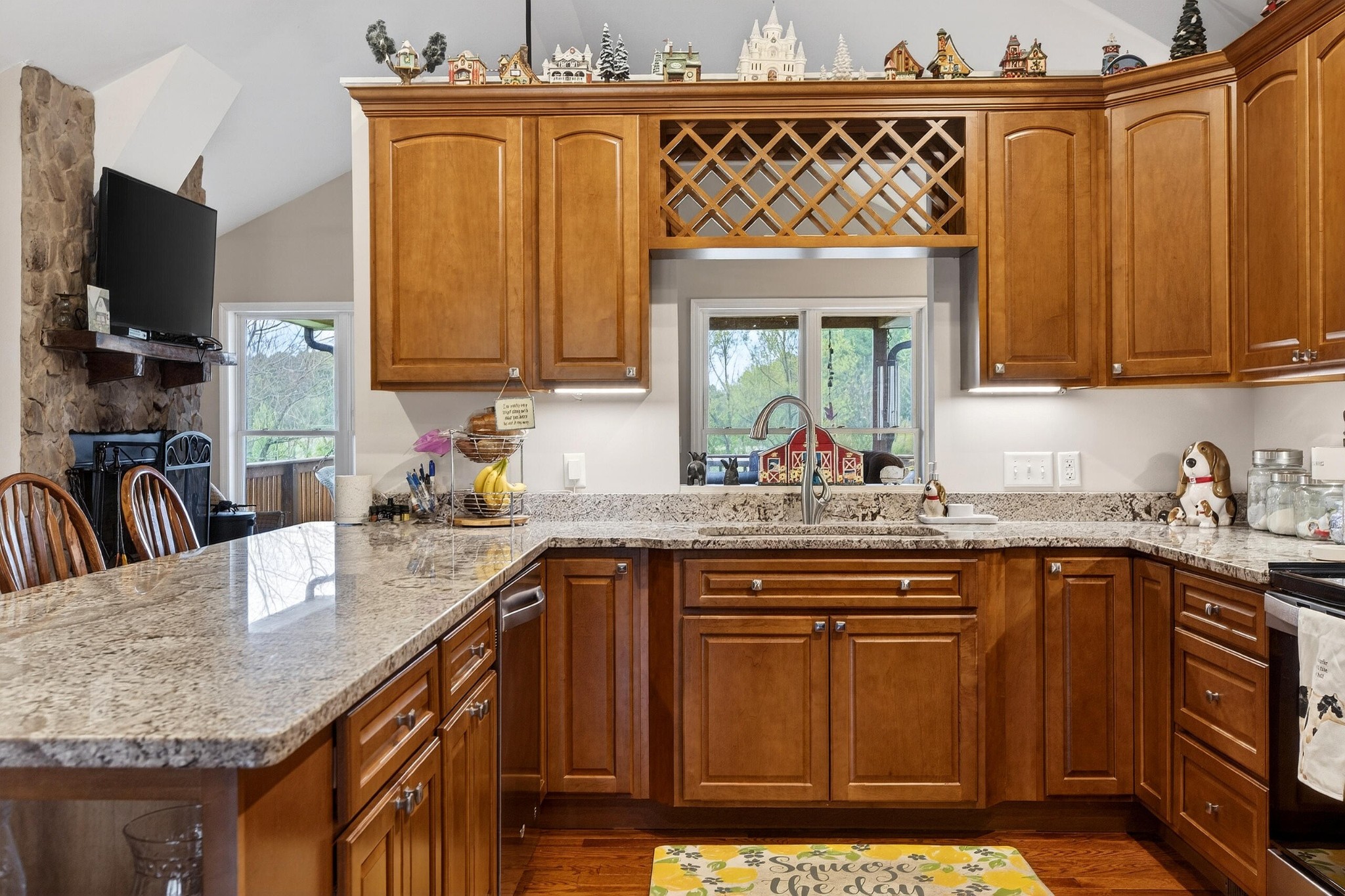 2181 Curbow Bridge Road Old Fort, TN 37362 - Photo 14 of 56 a kitchen with stainless steel appliances granite countertop a sink stove and cabinets