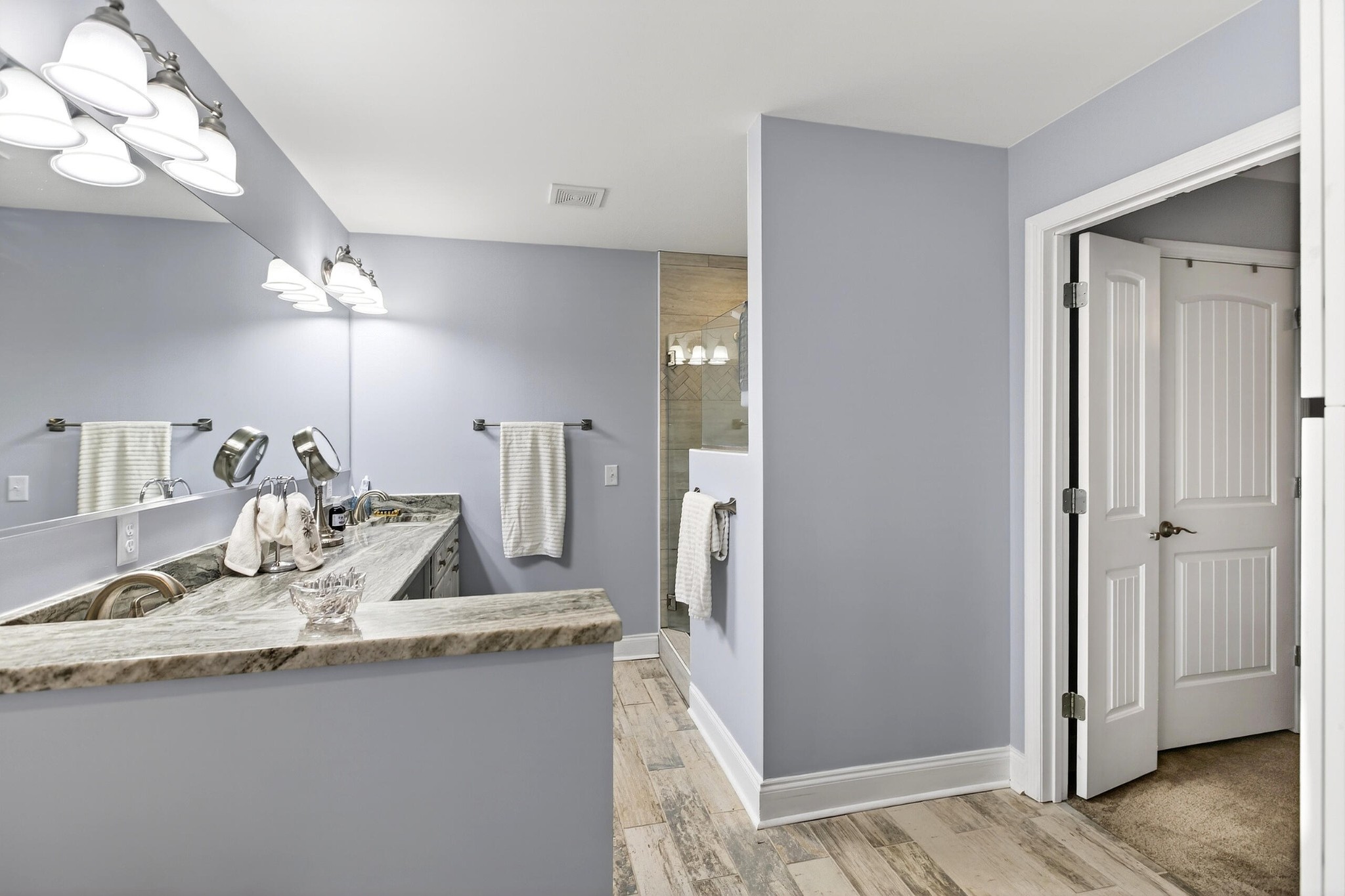 2181 Curbow Bridge Road Old Fort, TN 37362 - Photo 25 of 56 a bathroom with a sink and a mirror