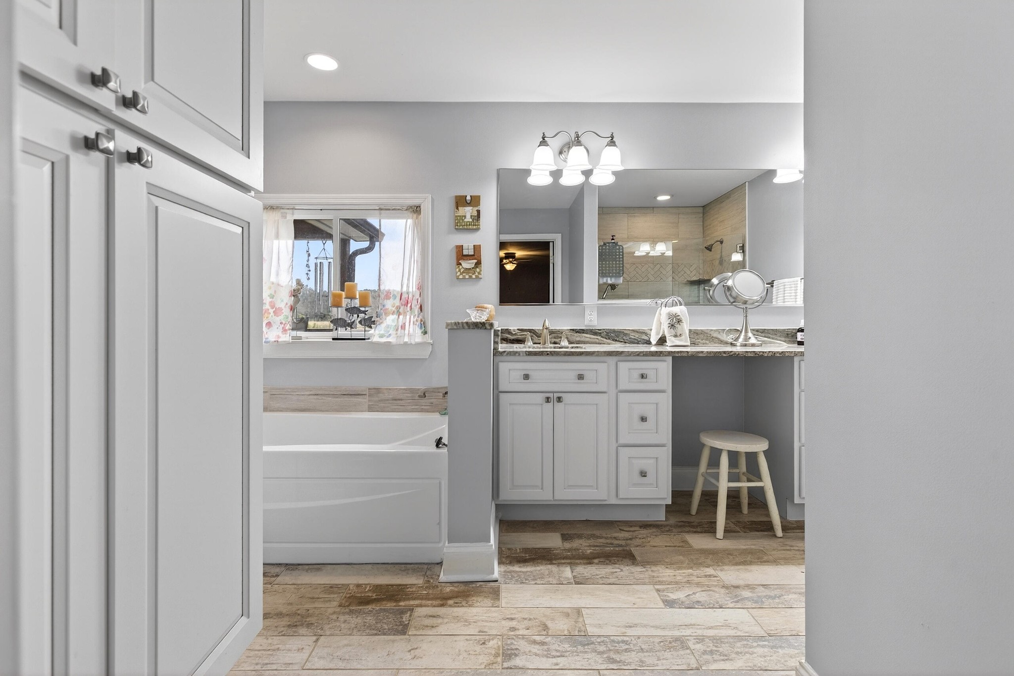 2181 Curbow Bridge Road Old Fort, TN 37362 - Photo 26 of 56 a bathroom with a sink and a mirror