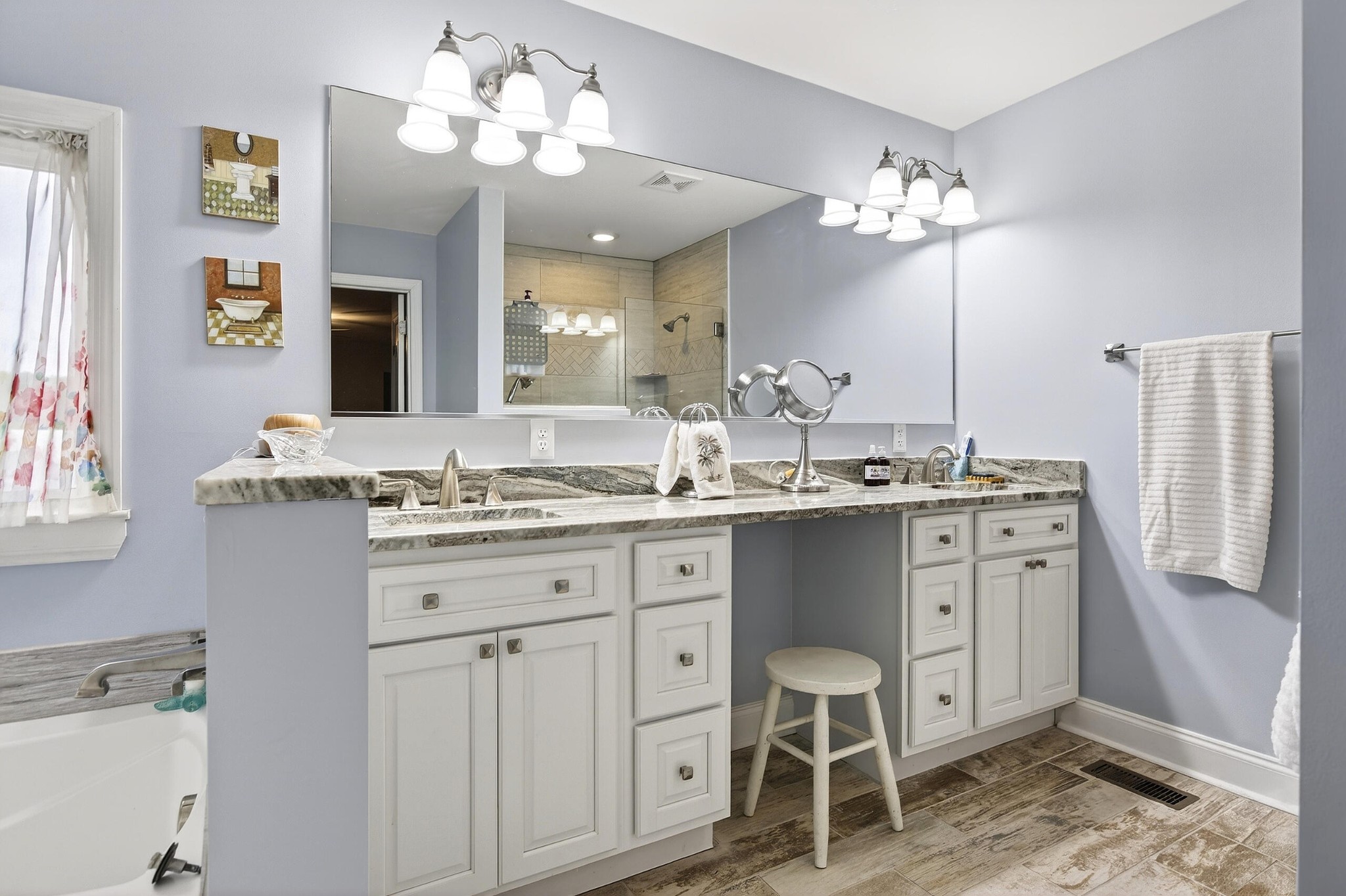 2181 Curbow Bridge Road Old Fort, TN 37362 - Photo 29 of 56 a bathroom with a granite countertop sink a toilet and a mirror