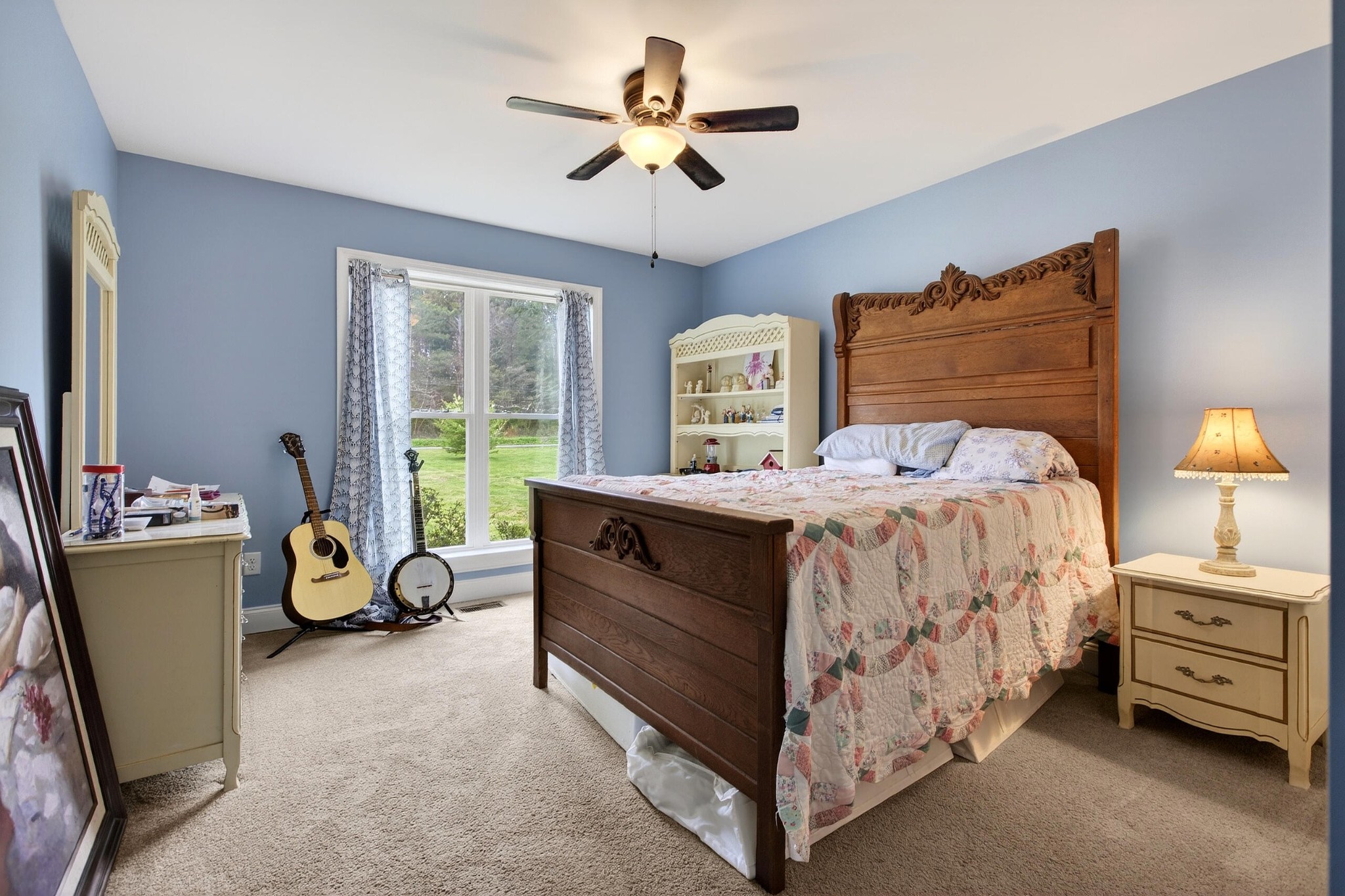 2181 Curbow Bridge Road Old Fort, TN 37362 - Photo 31 of 56 a bedroom with a bed and a chandelier