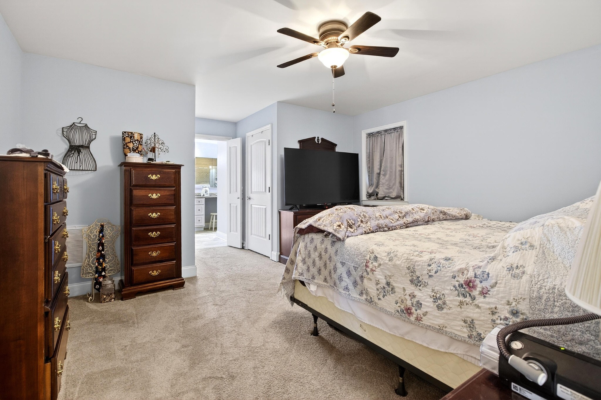 2181 Curbow Bridge Road Old Fort, TN 37362 - Photo 32 of 56 a bedroom with a bed and a chandelier