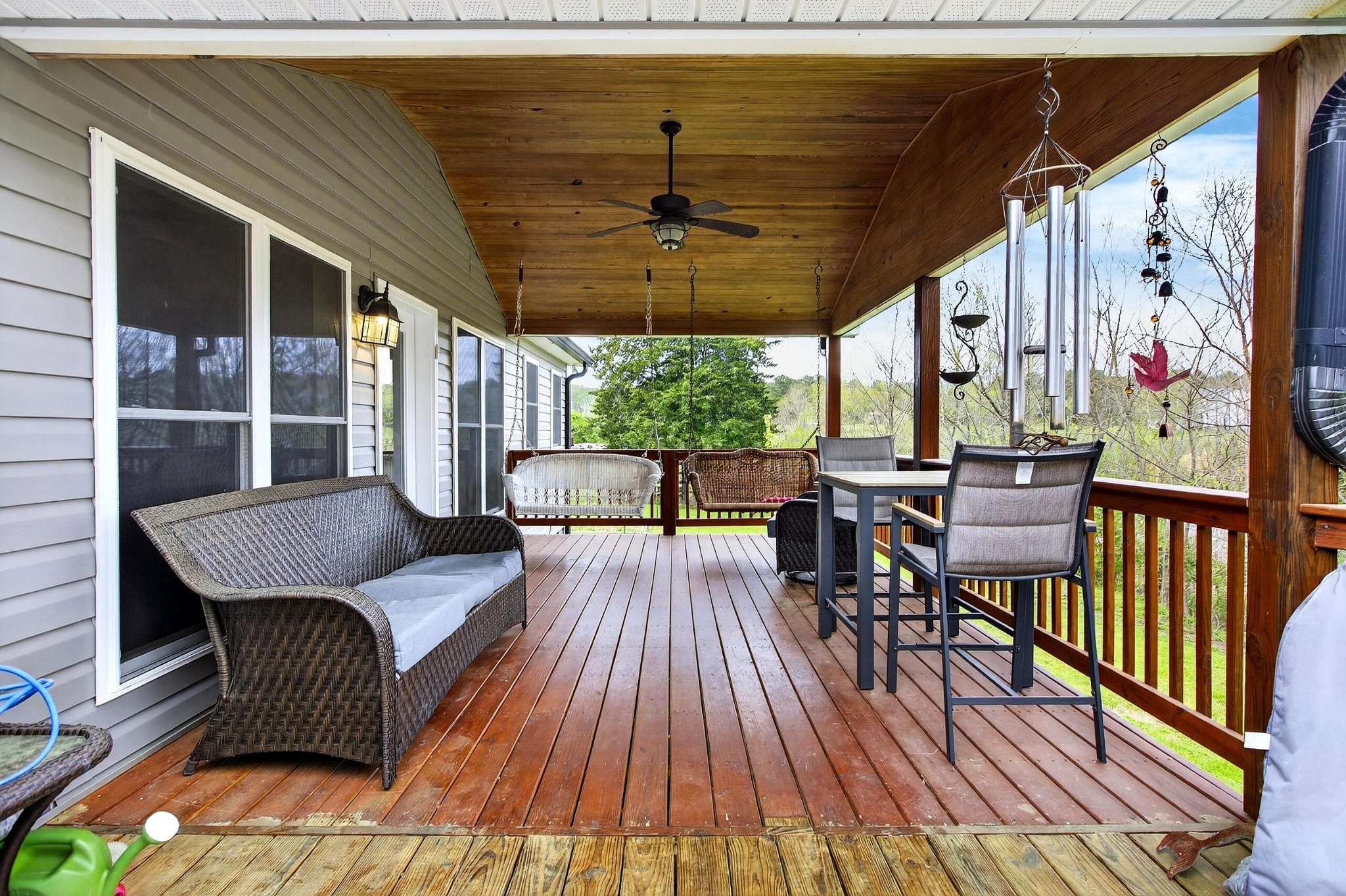 2181 Curbow Bridge Road Old Fort, TN 37362 - Photo 38 of 56 a outdoor living space with furniture and wooden floor
