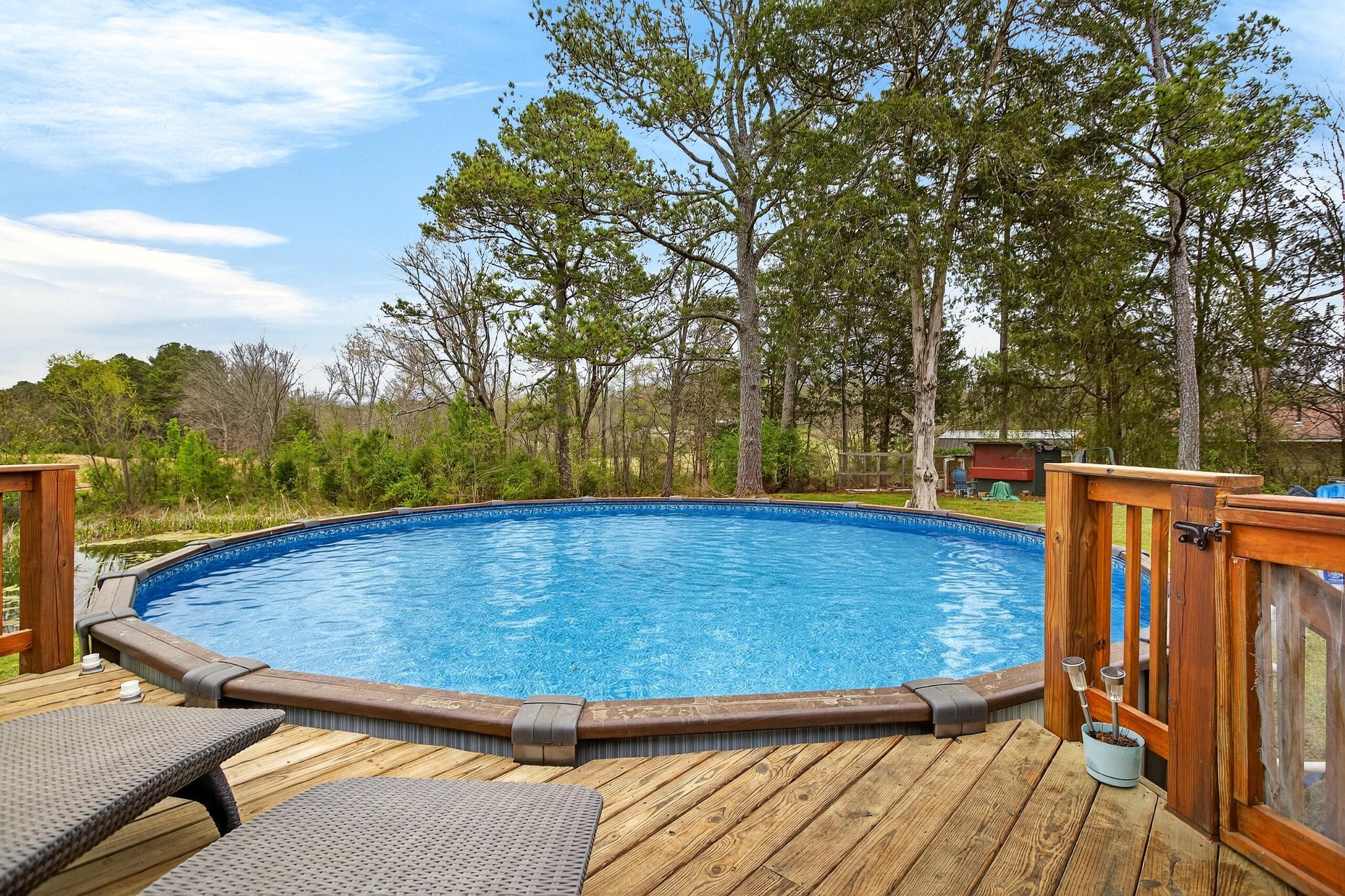 2181 Curbow Bridge Road Old Fort, TN 37362 - Photo 40 of 56 a view of a swimming pool with a lounge chairs