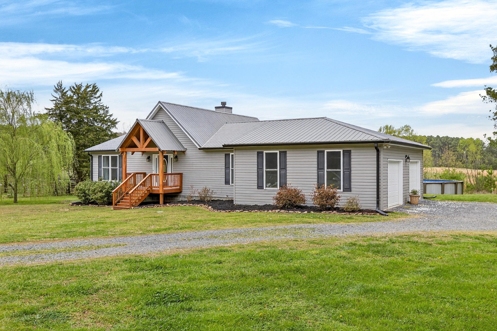 2181 Curbow Bridge Road Old Fort, TN 37362 - Photo 4 of 56 a view of a house with a patio