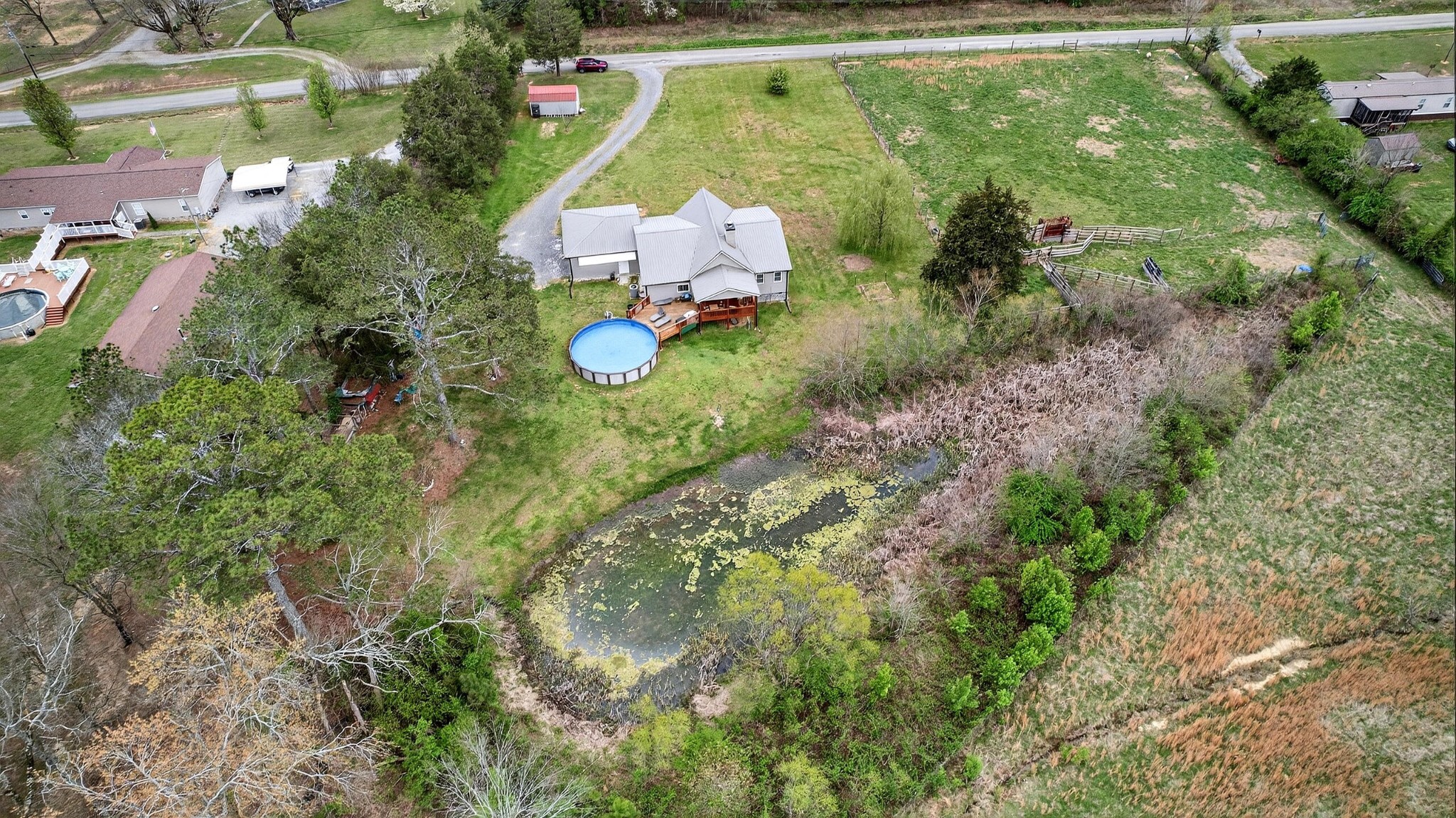 2181 Curbow Bridge Road Old Fort, TN 37362 - Photo 47 of 56 an aerial view of residential houses with outdoor space