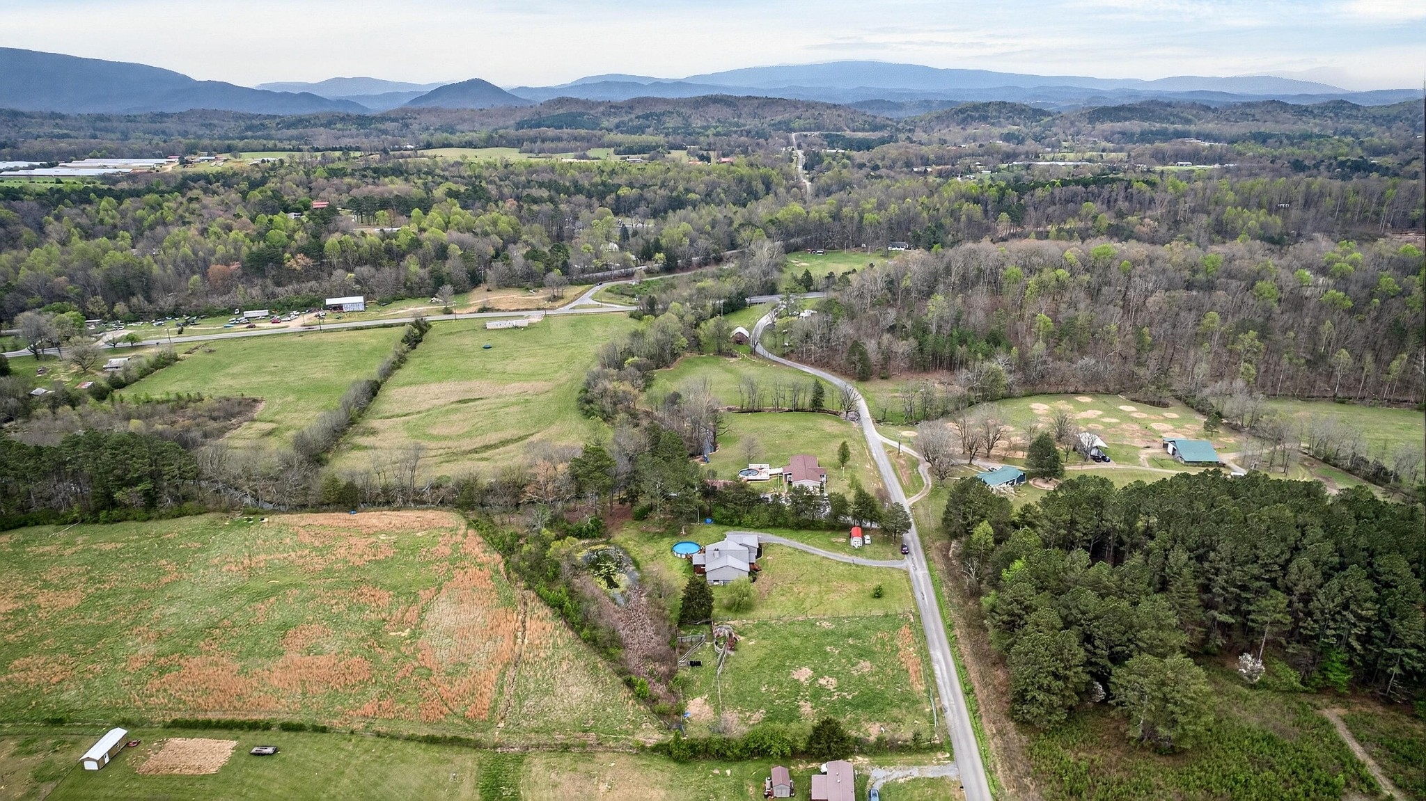 2181 Curbow Bridge Road Old Fort, TN 37362 - Photo 50 of 56 a view of a city with mountains in the background