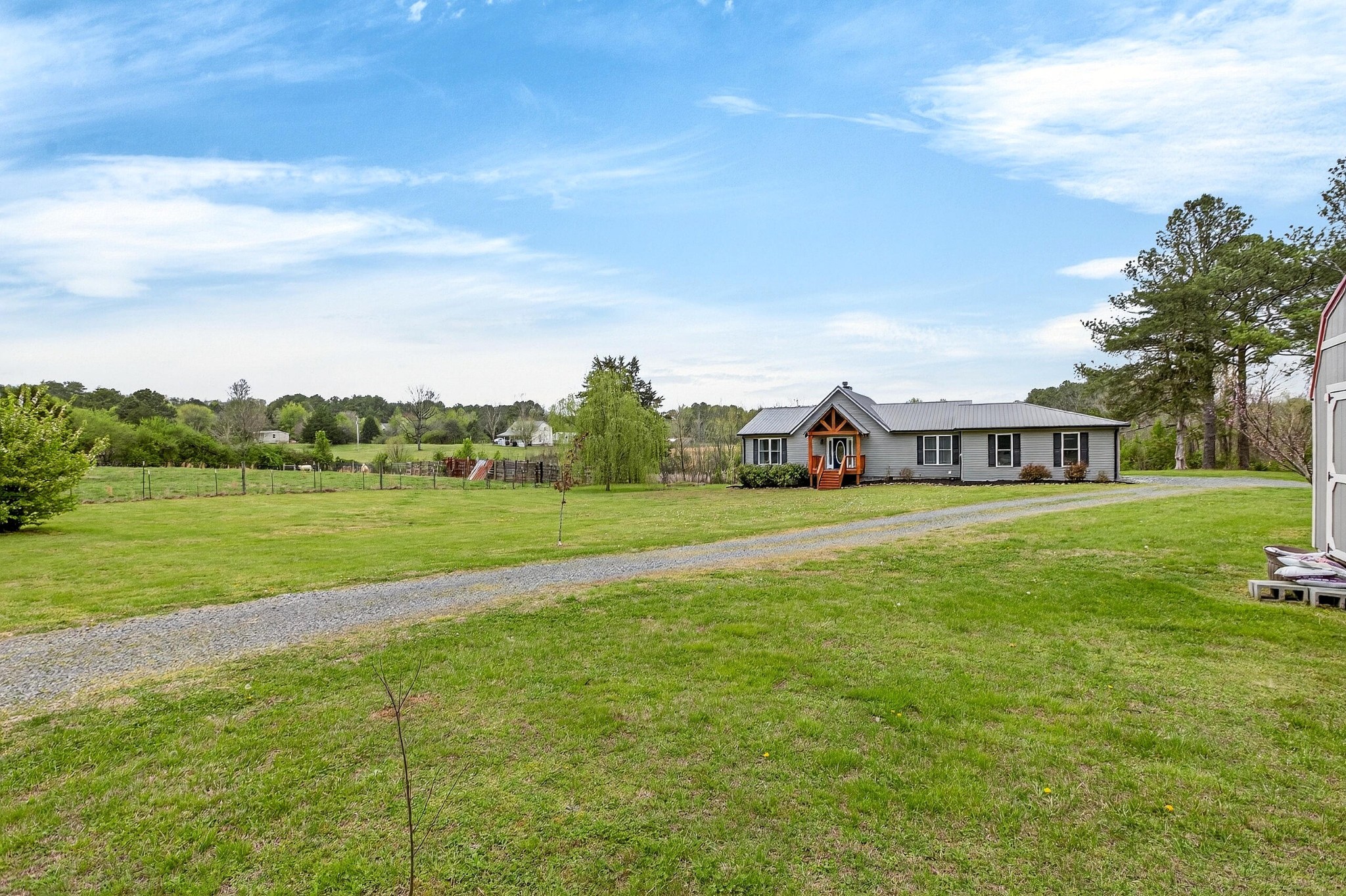 2181 Curbow Bridge Road Old Fort, TN 37362 - Photo 5 of 56 a view of a house with a big yard