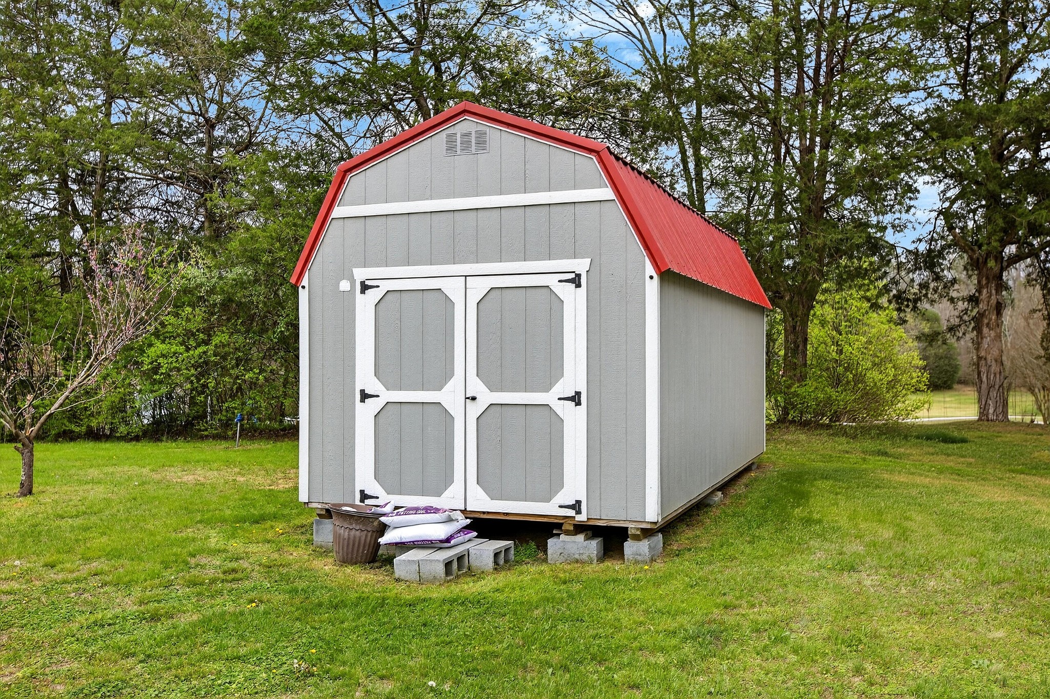 2181 Curbow Bridge Road Old Fort, TN 37362 - Photo 6 of 56 a front view of a house with garden