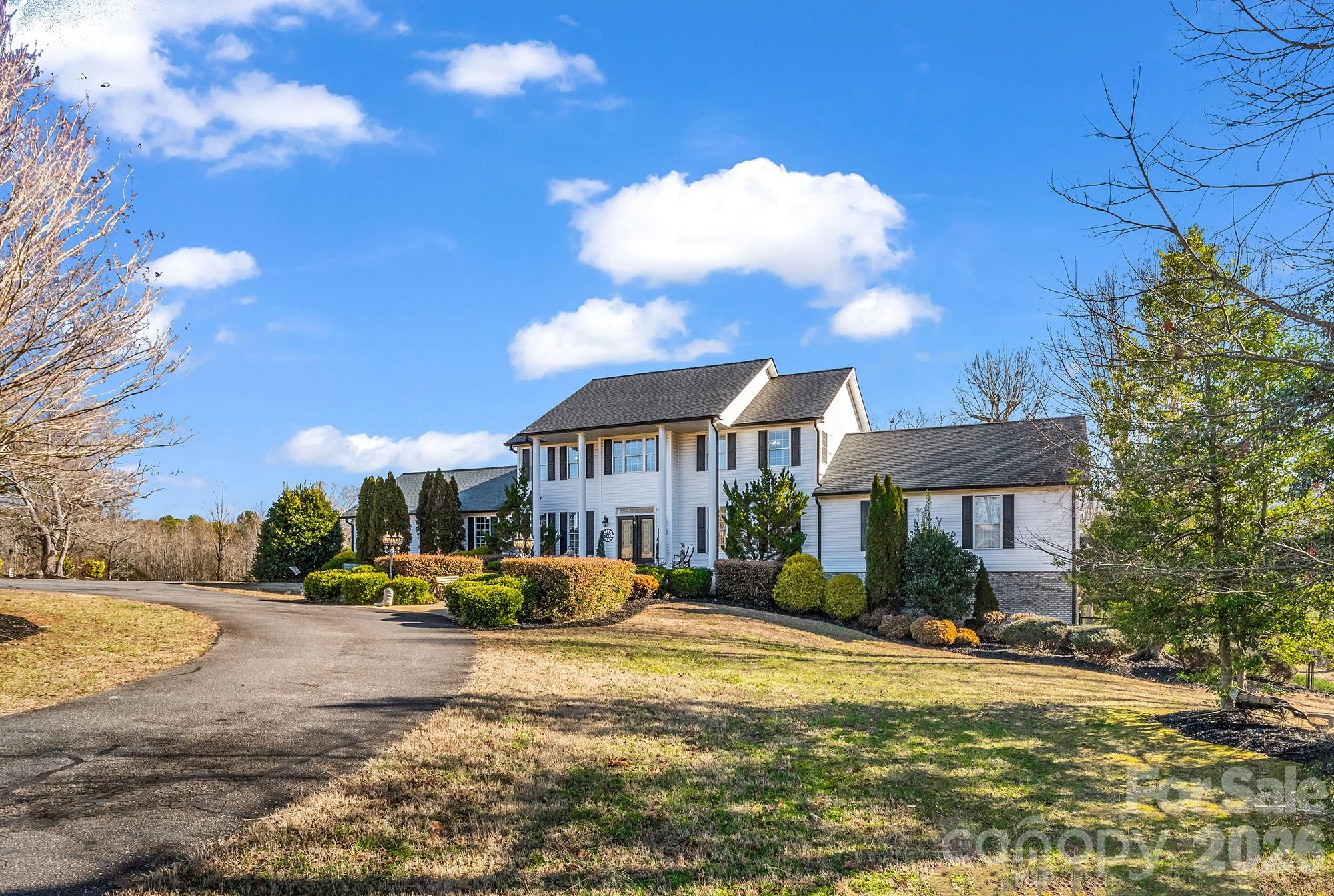 532 Harvey Logan Road Bostic, NC 28018 - Photo 4 of 48 a view of a white house with a yard