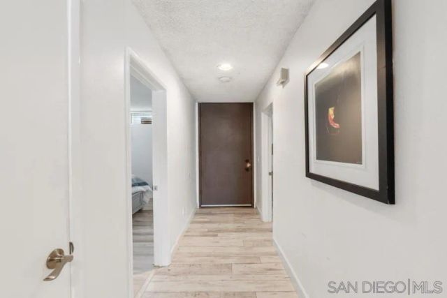a living room with fireplace furniture and a flat screen tv