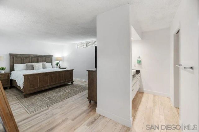 a white refrigerator freezer sitting inside of a kitchen