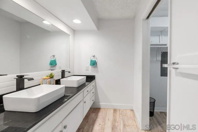 a view of a swimming pool with a lounge chairs