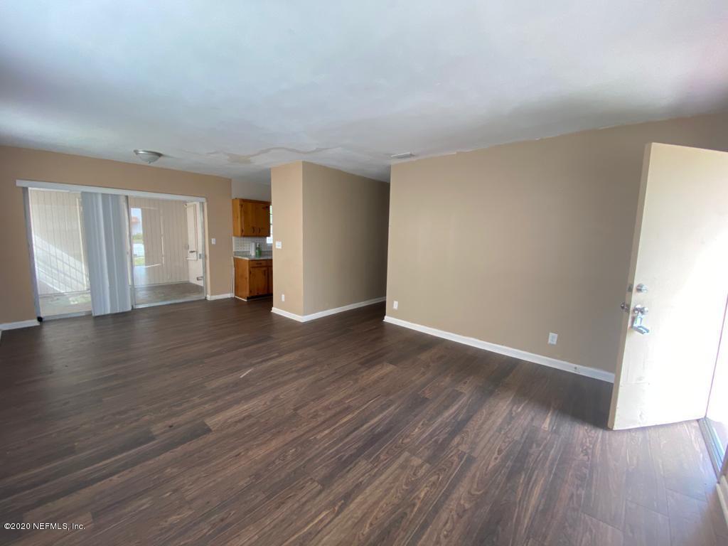 7503 Merrill Road Jacksonville, FL 32277 - Photo 15 of 23 Wood laminate flooring