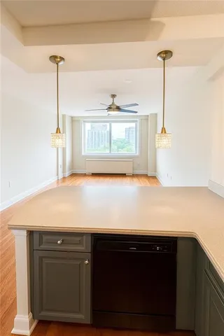 a room with a bed and a window