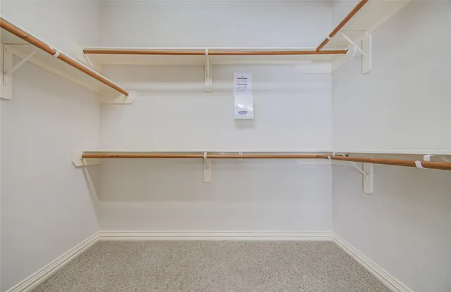 a view of a room with racks on the wall