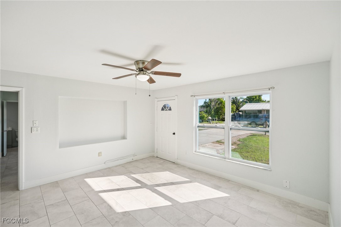 18472 Iris Road Fort Myers, FL 33967 - Photo 19 of 27 a view of an empty room with a window