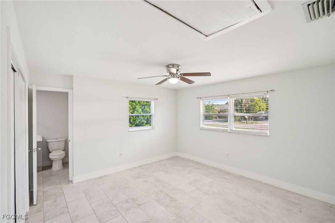 18472 Iris Road Fort Myers, FL 33967 - Photo 20 of 27 a view of an empty room with a window